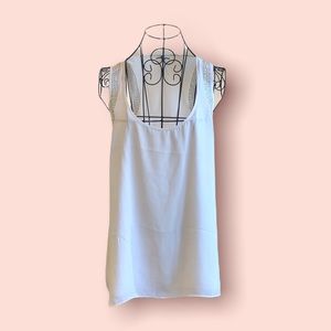 Embellished racer back blouse size M